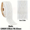 Roll of white 3D embossed peel-and-stick foam wall panels showing the texture and size.