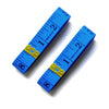 A blue fiberglass tape measure showing markings up to 2 inches.