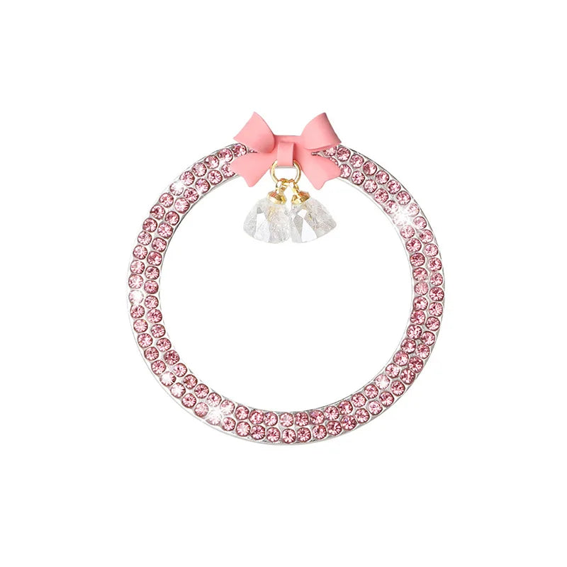 Rosa Strass-Schleife mit klaren Kristallakzenten.