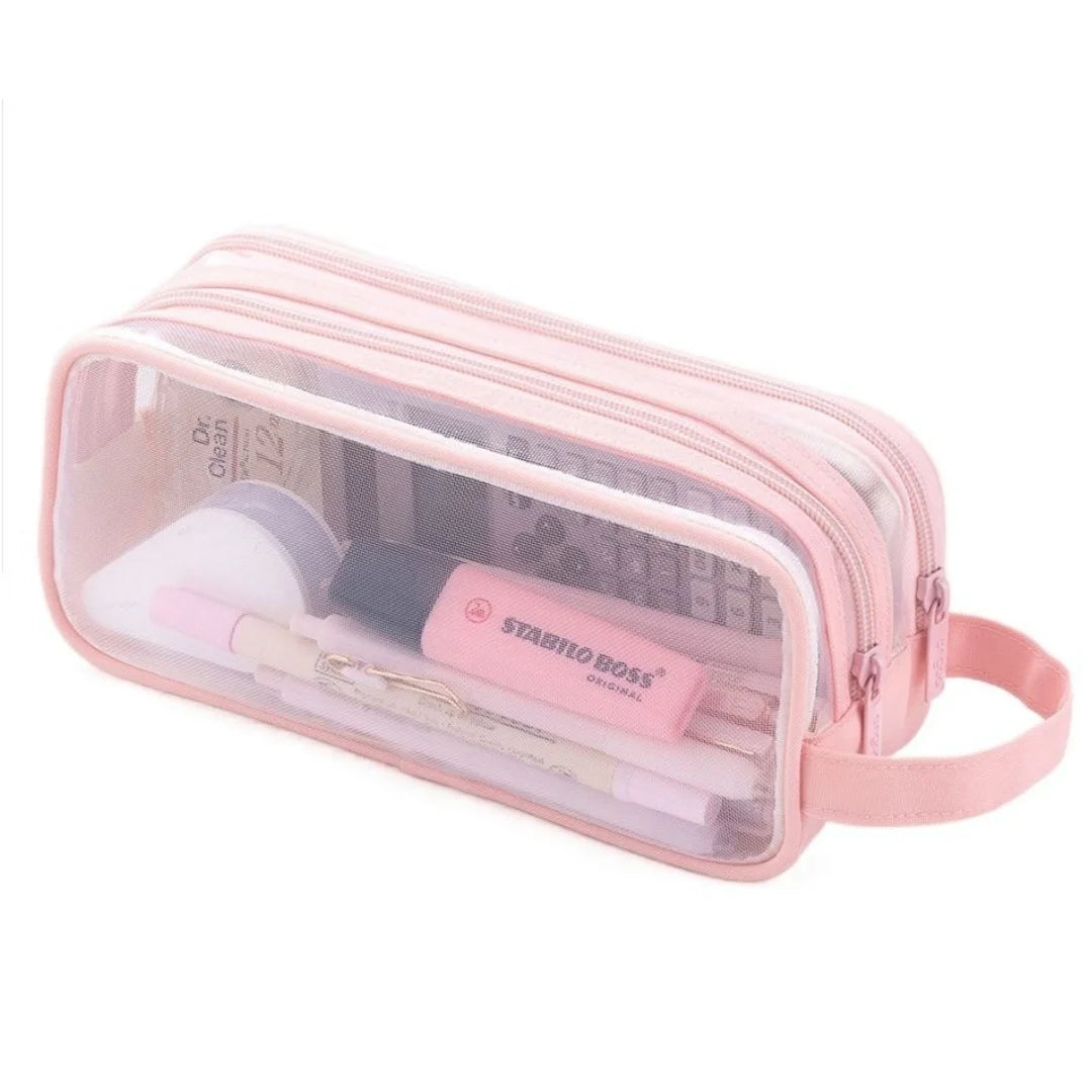A clear pink mesh pencil case with a zipper holding various school and office supplies.