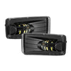 Black LED fog light assembly for Chevy Silverado, Tahoe, Suburban, and GMC Yukon.