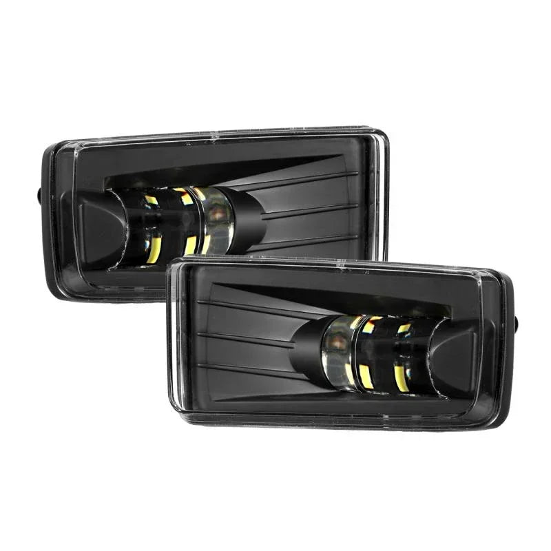 Black LED fog light assembly for Chevy Silverado, Tahoe, Suburban, and GMC Yukon.