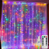Purple and pink LED curtain lights with colorful string lights illuminating a window or backdrop.