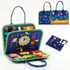 A colorful Montessori busy board for toddlers featuring various sensory learning toys and fabric pouches.