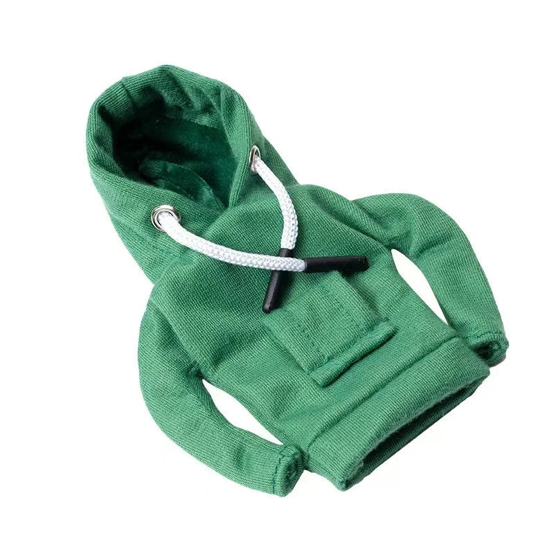Tapa de palanca de cambio de forro de polar verde oscuro con detalles de cordón blanco.