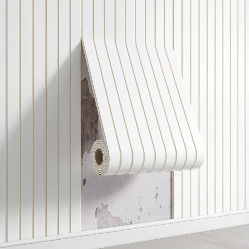White vertical ribbed wall panels with a rolled-up panel displaying a textured gray surface.