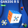 A close-up view of a GAN 356 RS speed cube, showing its orange and blue magnetic layers, set against a blue background.