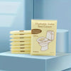 A package of 10 fleshable toilet seat covers in yellow is displayed on a white surface.