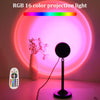 An RGB 16 color projection light is shown with a remote control and a light beam illuminating a room.