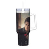 A stainless steel tumbler with a straw lid featuring a close-up portrait of a man.