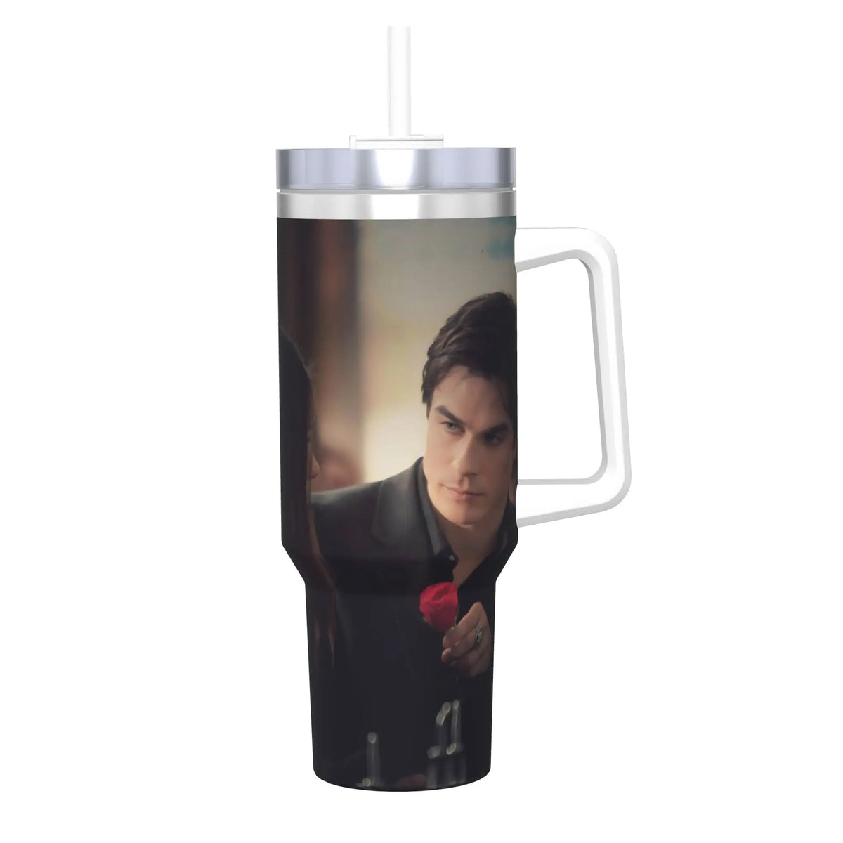A stainless steel tumbler with a straw lid featuring a close-up portrait of a man.