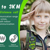 A young girl holds a green walkie-talkie device outdoors, demonstrating its long-distance communication capabilities.