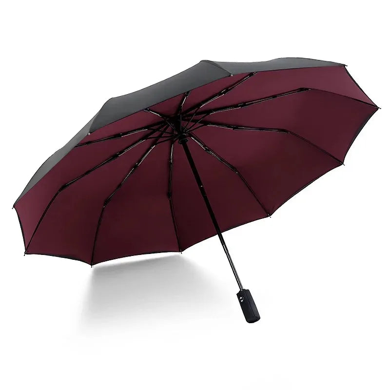 A dark burgundy double-layer windproof umbrella viewed from above.