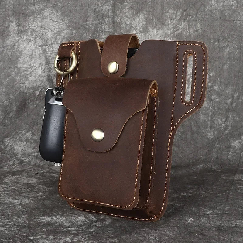 A brown genuine leather waist bag with multiple pockets and a clip is shown against a dark gray background.