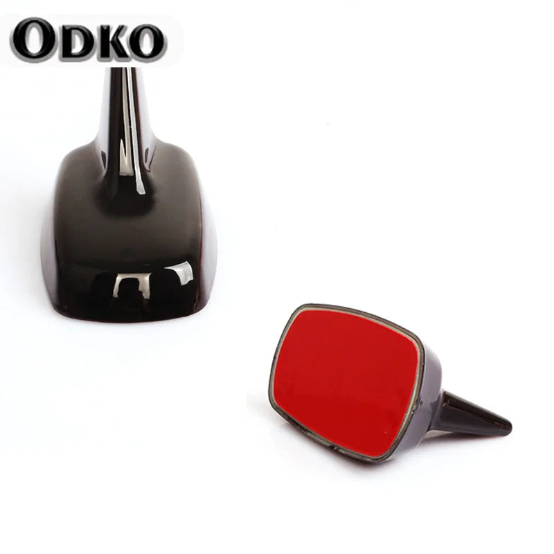 A black shark fin roof antenna for VW and Audi models.