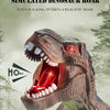 A close-up of a simulated dinosaur roar from a remote control toy T-Rex, showing its mouth wide open and teeth visible.