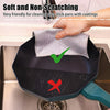 A hand is wiping a black non-stick pan with a gray scouring cloth, demonstrating the soft and non-scratching features.