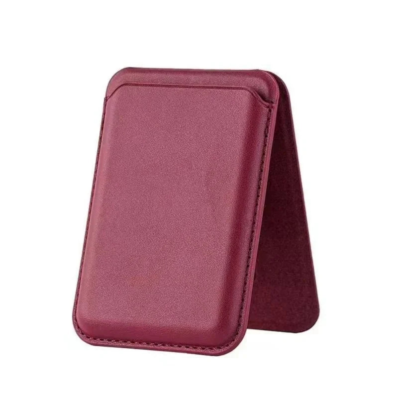 A deep magenta magnetic leather wallet case with a kickstand for an iPhone.