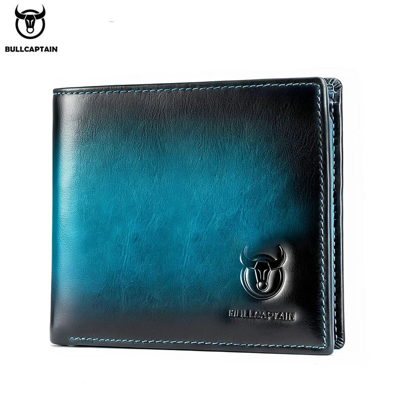A dark teal genuine leather bifold wallet featuring a silver bull head emblem.