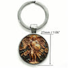 Silver key chain featuring a round medallion depicting the Saint Michael Archangel