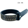 A black adjustable ring and bracelet sizer tool with numbered markings and a clasp.