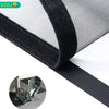 Close-up view of a black self-adhesive mosquito net window screen with a zipper detail.