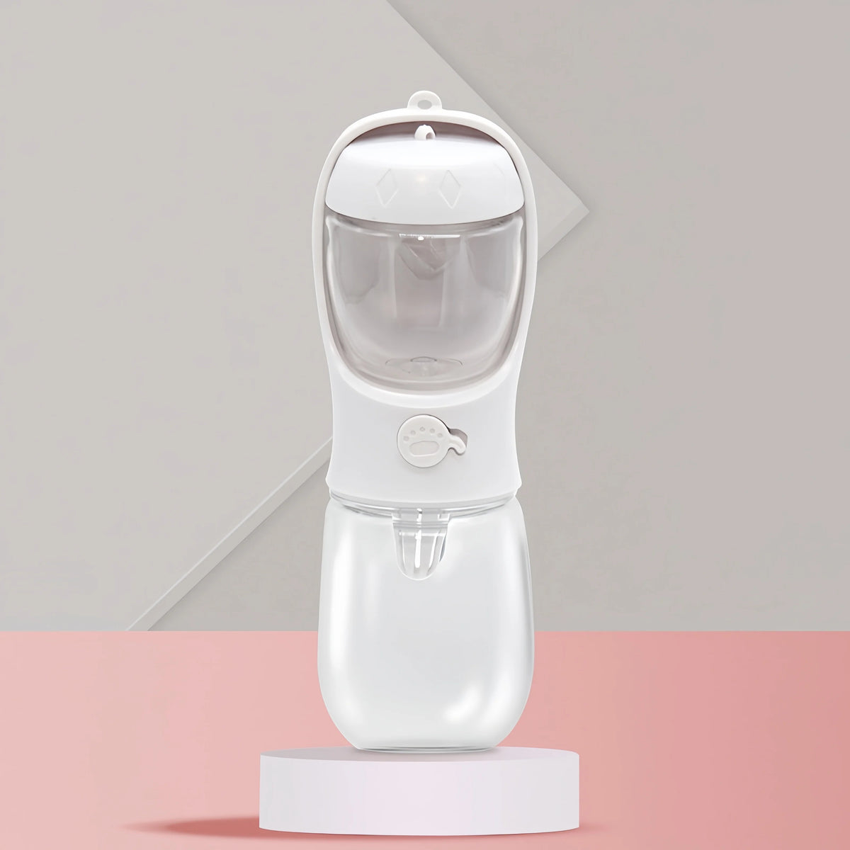 A white all-in-one portable pet water bottle with food storage shown on a pink surface.