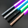 An RGB heavy dueling lightsaber with a metal hilt, showing vibrant blue, green, and purple light beams.