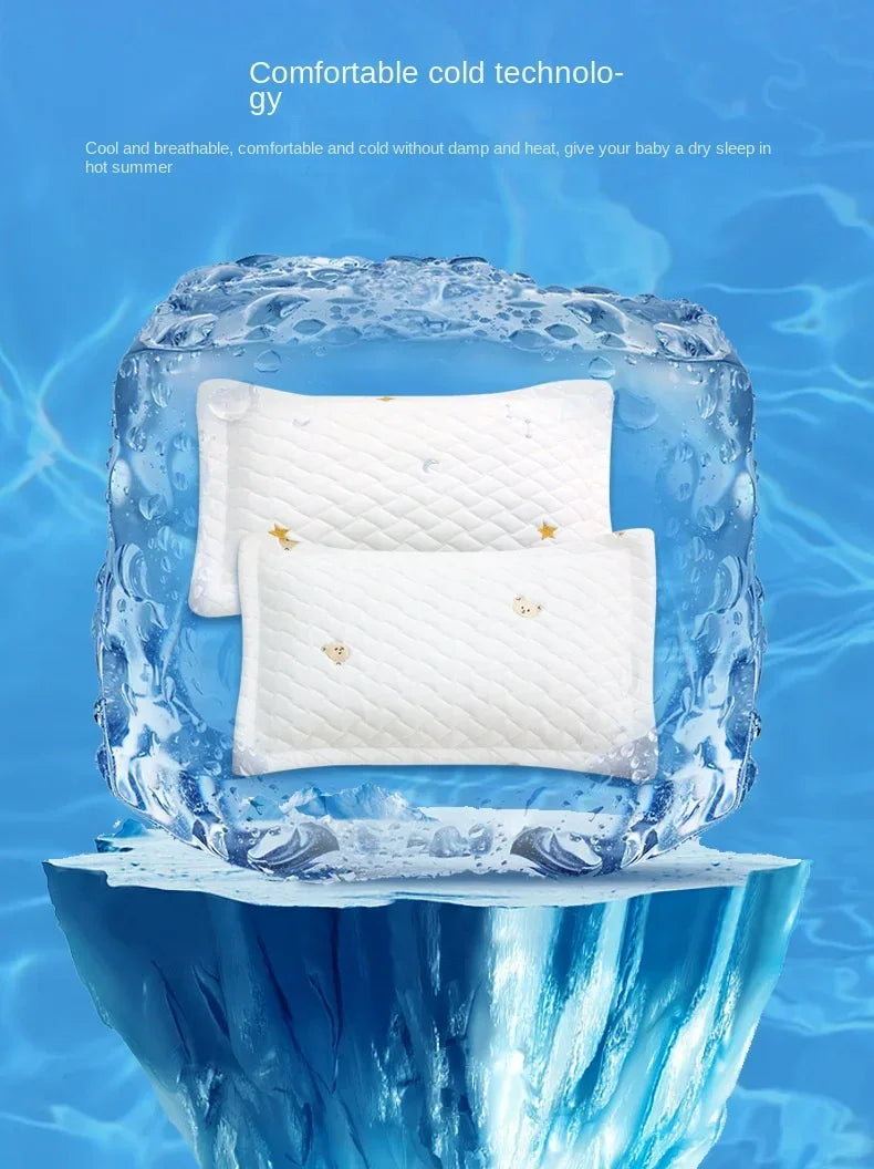 A white baby pillow is encased in a block of ice, illustrating comfortable cold technology for baby sleep.