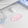 A white ergonomic wrist rest set featuring a cloud-shaped pink silicone pad for a keyboard and mouse.