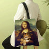 A canvas tote bag featuring a painting of a cat in a landscape by Van Gogh.
