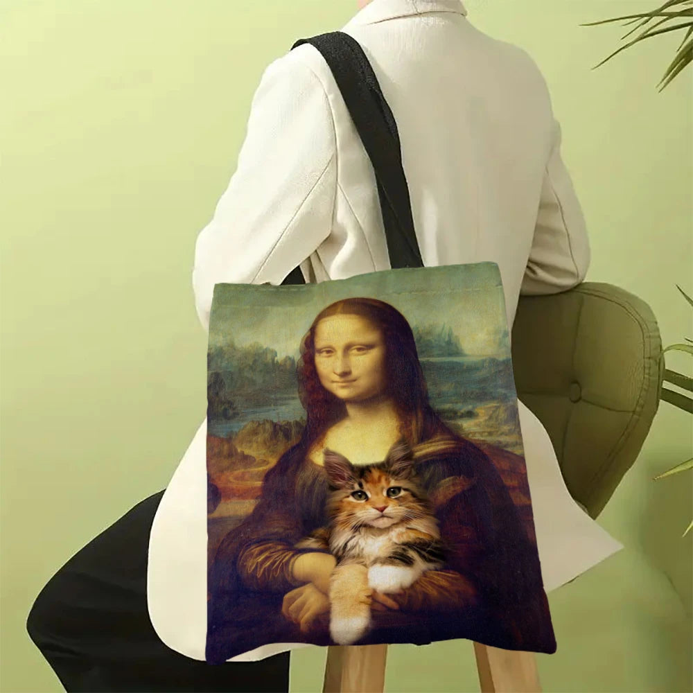 A canvas tote bag featuring a painting of a cat in a landscape by Van Gogh.