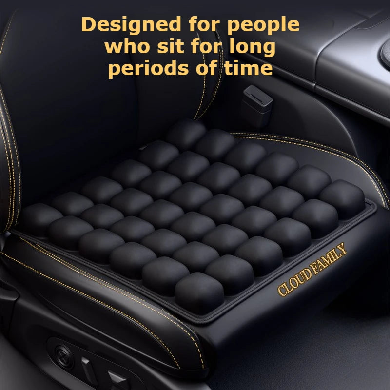 Black press-to-inflate seat cushion with a textured surface designed for long sitting periods.