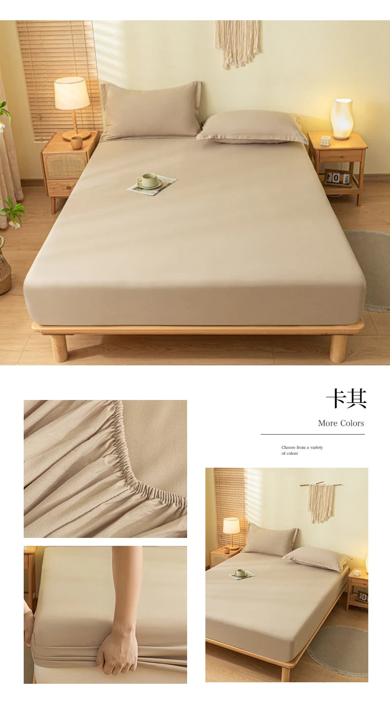 A beige fitted sheet is displayed on a wooden bed frame with natural light and decorative elements.