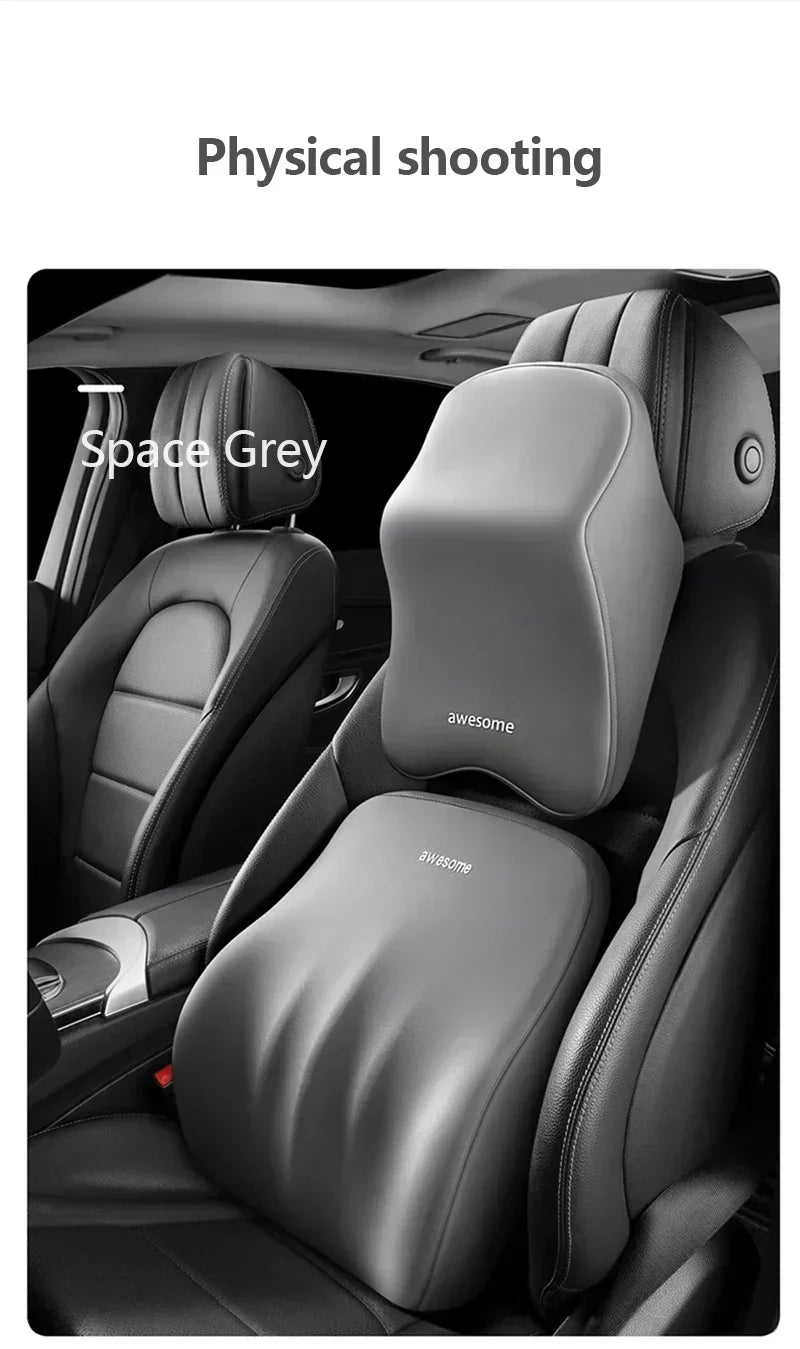 A close-up view of a black memory foam car headrest and lumbar support pillow in Space Grey color.