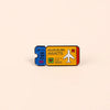 A vintage airline ticket enamel brooch set featuring an adventure awaits design with a plane and heart symbols.
