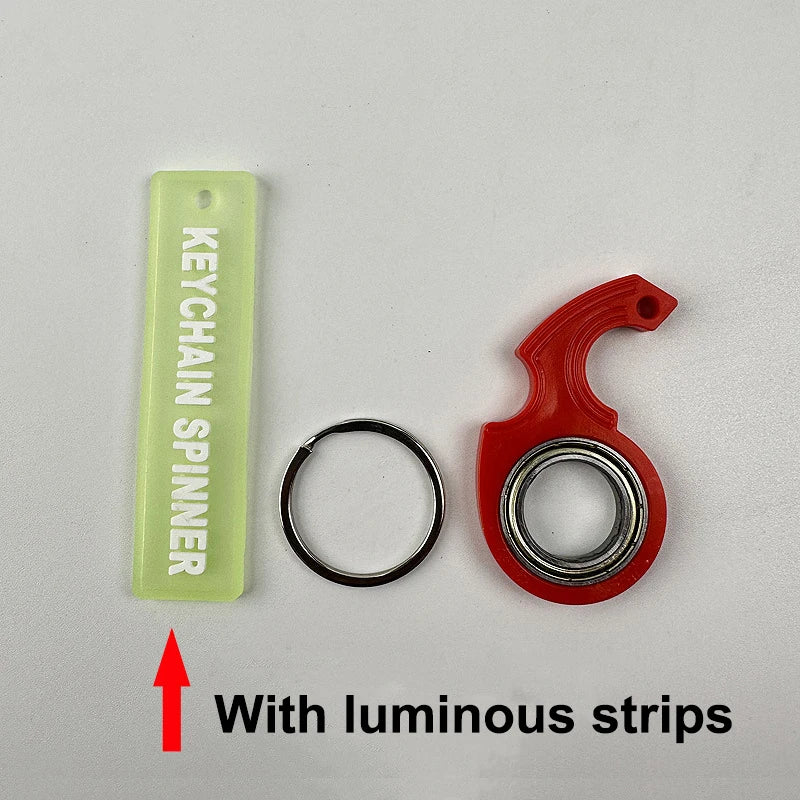 A lime green keychain spinner with luminous strips and a red plastic spinner component.