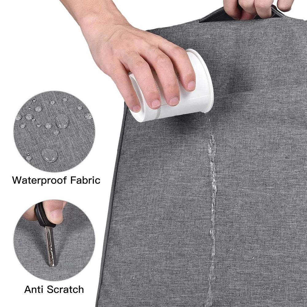A hand is holding a white waterproof laptop sleeve with a handle, highlighting its anti-scratch features.