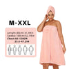 A woman models a peach-colored wrap robe and turban set with a bow accent.