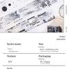 Decorative PET washi tape featuring a black and white mottled collage design on a transparent background