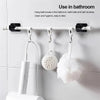 Two self-adhesive no-drill curtain rod brackets are shown mounted on a white tile wall, used for hanging bath towels and brus