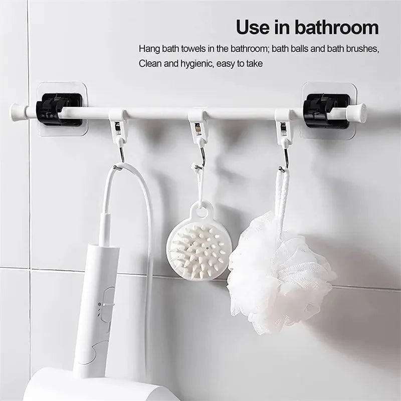 Two self-adhesive no-drill curtain rod brackets are shown mounted on a white tile wall, used for hanging bath towels and brus