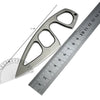 A fixed-blade neck knife with a serrated blade and a handle, shown next to a ruler.