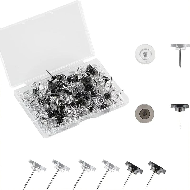 A clear plastic box containing 100 transparent push pins and thumb tacks.