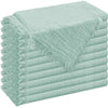 A stack of light mint green raw-edge polyester cloth napkins.