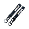 Black nylon keychain with embroidered wanted text and a steel spring clip