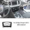 Carbon fiber interior trim kit for Dodge Charger featuring a steering wheel and center console components