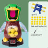 A green duck-shaped target game featuring a brown body, clear wings, and an internal mechanism for shooting soft darts.