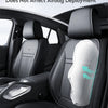 A close-up view of a black car seat with a white protective cover installed, emphasizing safety features.