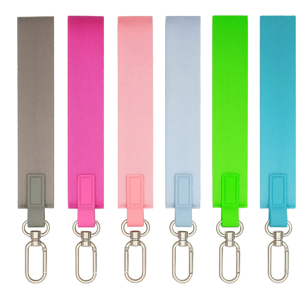 A set of five multicolor nylon wristlet keychain straps in pink, gray, light blue, lime green, and cyan.